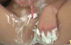 Lovely young lady shaving her pussy