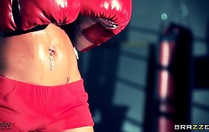 Boxer girl aryana augustine hitting the bag in the gym