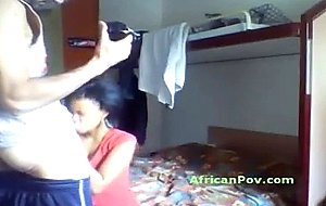 Black hoe with crazy hair-do sucks white cock in amateur vid