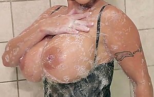 Holly halston soaping up her huge boobs in the shower