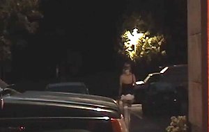 Crossdresser by the car
