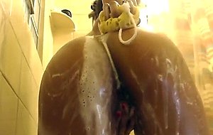 Horny chick making a honey video under shower