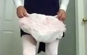 Diapered sissy in teddybear shortalls wetting diaper