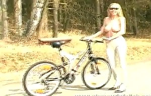 Katherina topless on bike