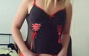 Blonde teenager masturbates on...
