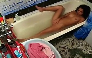 Spycam films a teen going solo in the bathtub