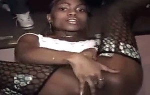 Nasty ebony stretches her legs and fingers pussy