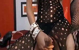 Colombian shemale in bodystocking jerking off her huge cock