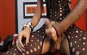 Colombian shemale in bodystocking jerking off her huge cock