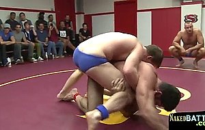 Tall muscular stud getting grappled   