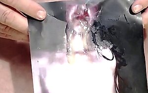 Slut gets a creamy load on her face and tits 