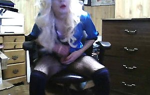 Blonde haired crossdresser enjoying herself on cam