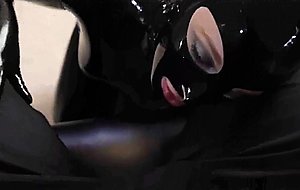 Noughty rubberdoll bj with latex mask & latex bj pants.