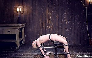 Blonde in strict device bondage is toyed