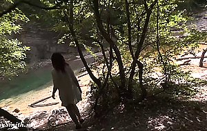 Strapped nude on a rope bridge in a canyon tour