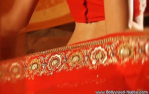 Bollywood woman in red dress for seduction and aro  