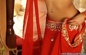 Bollywood woman in red dress for seduction and aro  