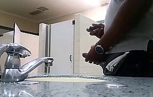 Black perv caught jerking in restroom  