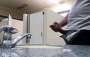 Black perv caught jerking in restroom 