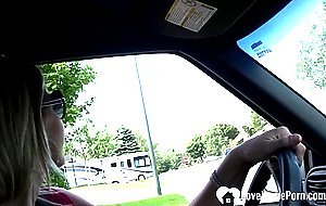 Sexy stepmom shows off feet while driving