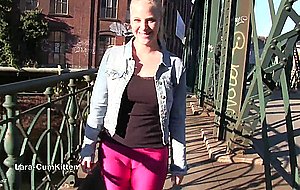 German blonde in tight leather pants