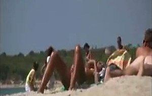 Sexy couple at the nudist beach