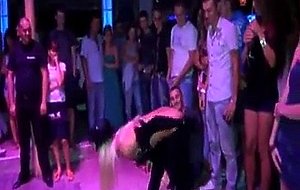 Catwoman stripper strips a guy naked in a club