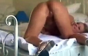 Pretty blond lass fucking on bed