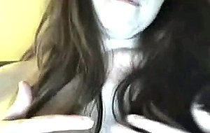 Shy girl plays with her big tits
