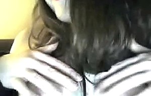 Shy girl plays with her big tits