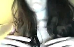 Shy girl plays with her big tits
