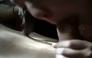 Video of a Korean chick sucking on a big dick