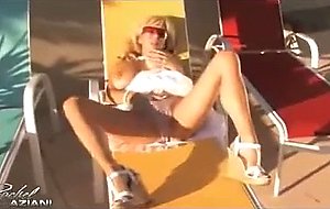 Rachel Aziani takes some sun and gets off on her ...