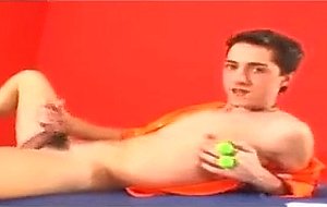 Cute boy Mark plays with some anal beads