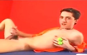Cute boy Mark plays with some anal beads