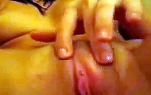 Video of a naked chick fingering her pussy