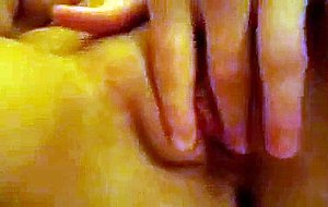 Video of a naked chick fingering her pussy
