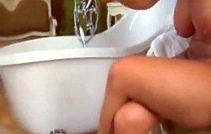 Amazing natural blonde gets done in the bathtub