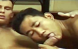 Two asian hunks sucking cock each other