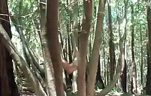 Tied guy ass and dick violated outdoor in the deep woo