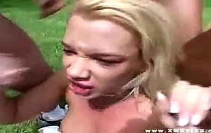 Blonde gobbles down throbbing dicks