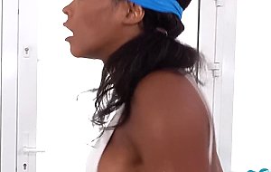 Busty black gym les riding dildo after workout