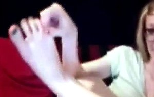 Hot blonde shows her feet on cam