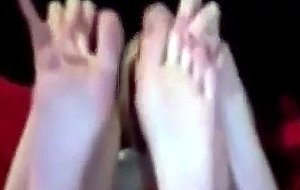 Hot blonde shows her feet on cam