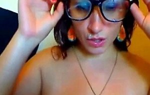 Girl with glasses facial on cam