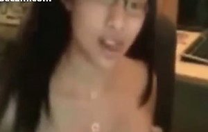Cute asian teen shows her big tits on webcam