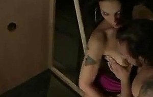 Tranny fucking muscled guy over the table