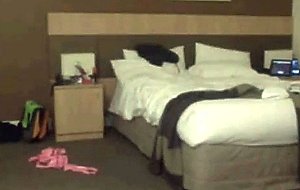 Amateur couple recording hotel room sex
