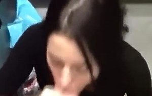 Hot brunette getting her mouth filled with cum in the changing room
