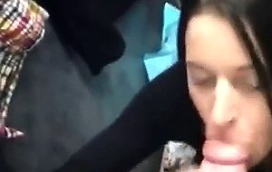 Hot brunette getting her mouth filled with cum in the changing room